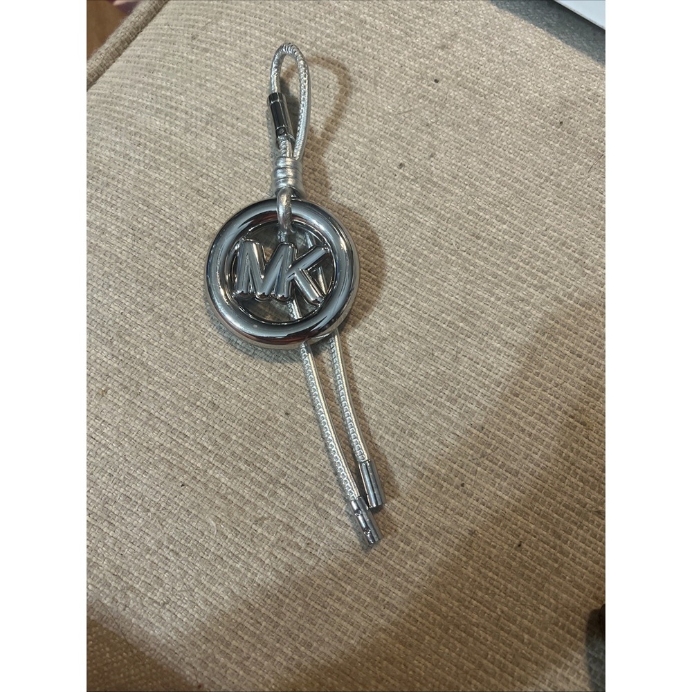 Michael Kors MK Logo Circle Bag Charm Keychain Silver Metallic Cord Accessory